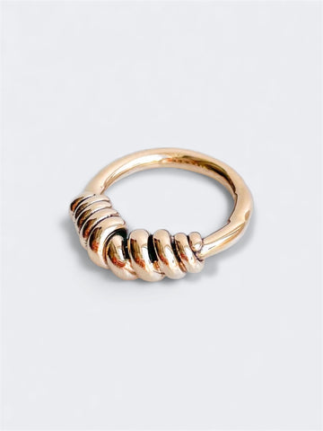 Small twisted together ring