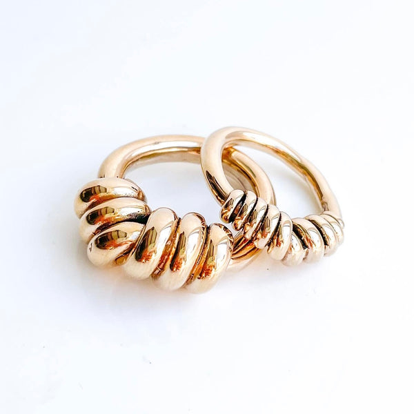 Small twisted together ring