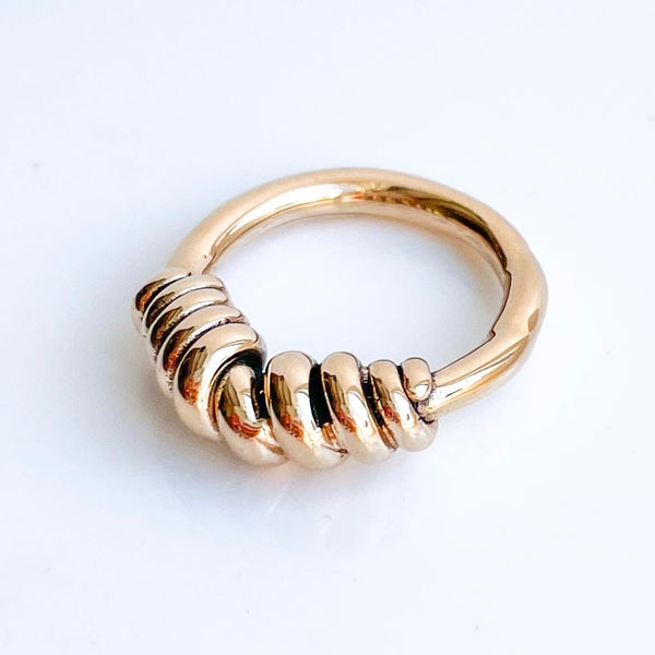 Small twisted together ring